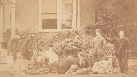 Charles Dickens Museum Photograph of Charles Dickens, friends (including Wilkie Collins) and his family at Gad's Hill