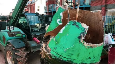 A photo of the damaged buoy