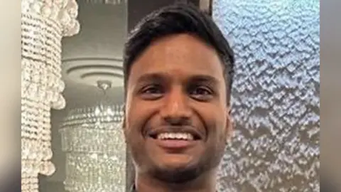 Family photo Shanghaman Gowribalan smiling