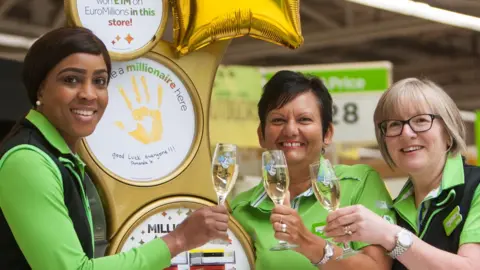 The National Lottery Vilma Abdulla who sold Amanda the ticket and Susan Hill who checked the ticket and told Amanda she had to call Camelot