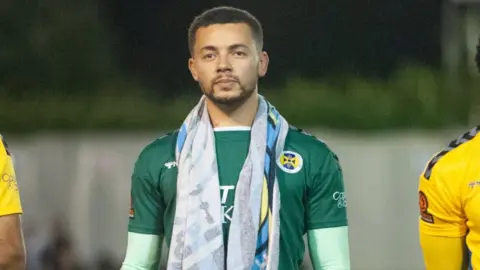 St Albans City FC Michael Johnson with his lucky towel