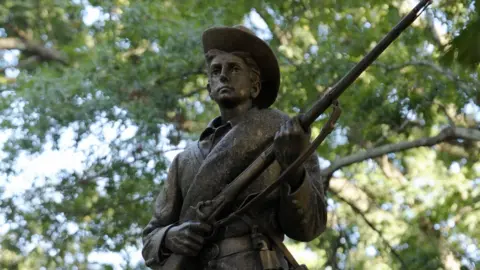 Sara Davis/Getty A Confederate statue, coined Silent Sam, before it was pulled down