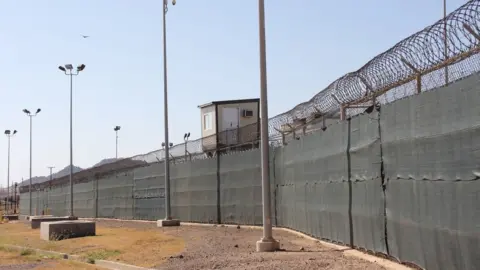 AFP A guard tower is seen outside the fencing of Camp 5 at the US military"s prison in Guantanamo Bay, Cuba.