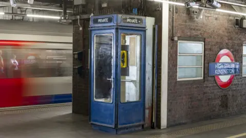 Historic England One of the iconic K8 phone boxes at High Street Kensington station