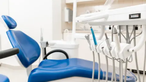 Getty Images Dental chair and equipment