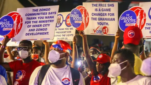 EPA Supporters of incumbent president and presidential candidate the leader of the New Patriotic Party (NPP) Nana Akufo-Addo attend an election rally in Kumasi, Ghana, 02 December 2020.