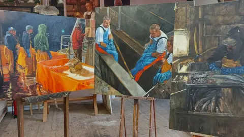 Henrietta Graham Three paintings by Henrietta Graham stand on easels in a studio