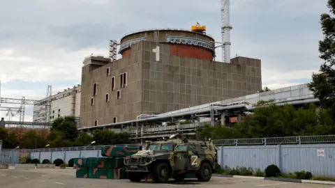 Reuters A Russian military vehicle outside the Zaporizhzhia plant, 1 September