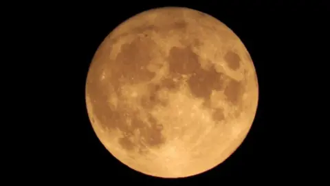 Head in the clouds/BBC Weather Watchers  Moon in Graveley