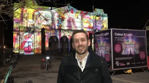 BBC/Naj Modak York Bid's operations manager stands in front of York Art Gallery Exhibition