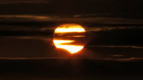 Ben Salter Photograph of the partial eclipse at Cosmeston Country Park, Penarth