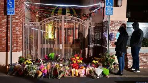 Getty Images Floral tributes outside the Star Dance Studio