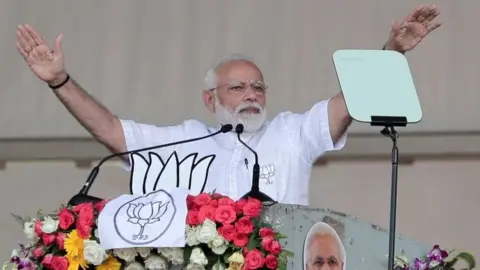 EPA Narendra Modi at an election rally