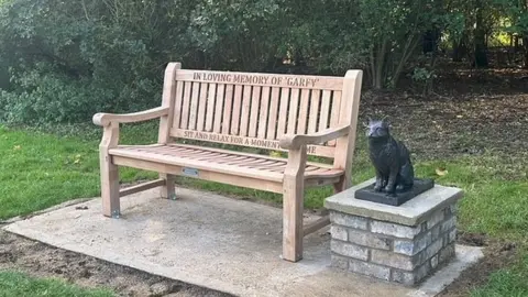 Sally Dunham Bench and statue of cat