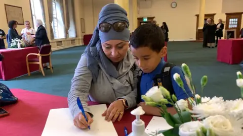BBC Simone Budeanu, and her six-year-old son Haroon Rahman