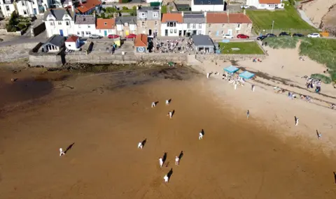 Reuters Cricket match at Elie beach