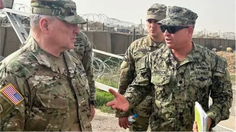 Reuters US Joint Chiefs Chair Army General Mark Milley speaks with US forces at a US military base in north-east Syria (04/03/23)