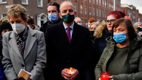 Reuters Taoiseach Micheal Martin at vigil