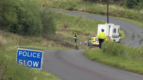 Police at the scene where the body was found