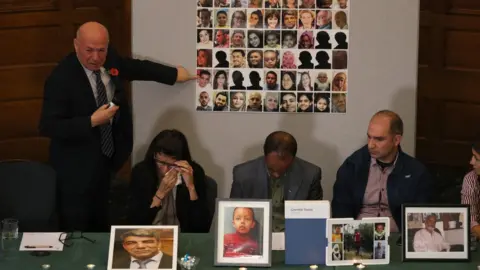 Getty Images Survivors of the fire, El Alami Hamdan, Flora Neda, Paulos Tekle and Hamid Al Jafari