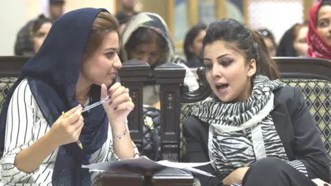 AFP Tahmina Arian (L), 26, talks with Tahmina Rashiq at the first public event for the 'Where Is My Name' campaign in Kabul, Aug 2017