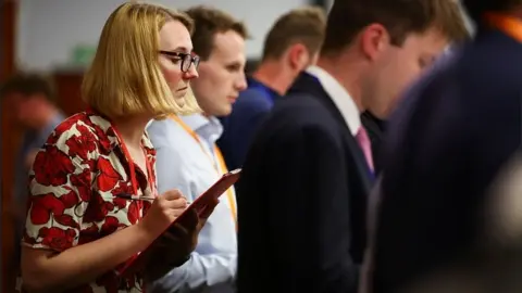 Reuters Official checking votes at a local election count