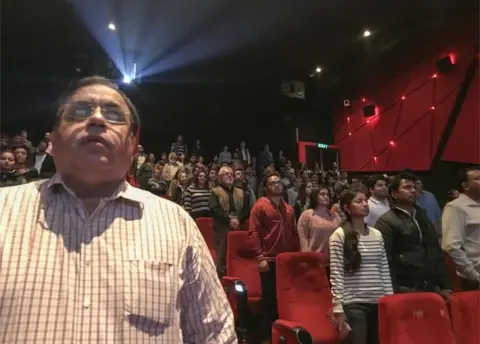 AFP Audience members stand for the Indian national anthem before a movie starts at a cinema in New Delhi on December 4, 2016.