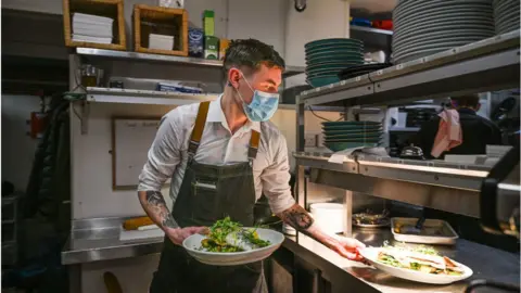 Getty Images Restaurant worker