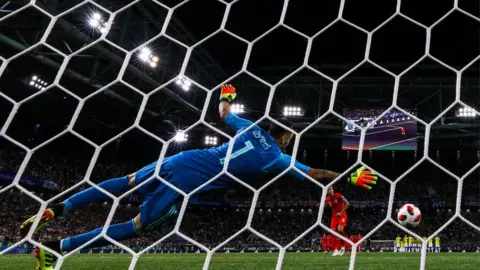 Getty Images Colombia's goalkeeper David Ospina concedes a goal in England game on Tuesday