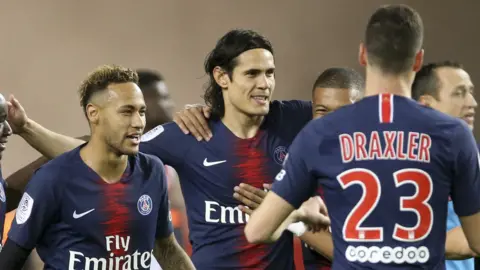 Edinson Cavani celebrates scoring against Monaco
