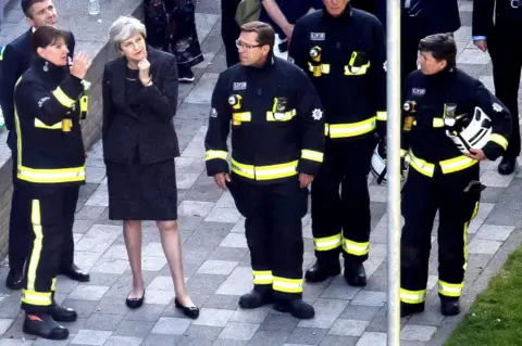 Getty Images Theresa May and Dany Cotton, Commissioner of the London Fire Brigade