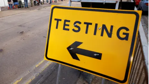 Reuters Covid-19 test centre sign