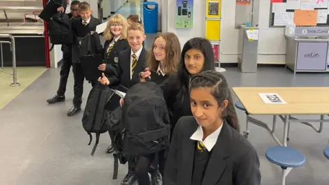 Newsome Academy Pupils have been given a blazer, jumper, bag and pencil case