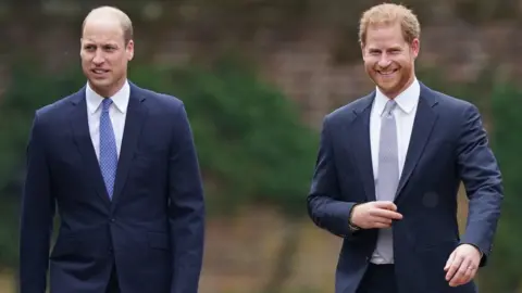 PA Media The Duke of Cambridge and Duke of Sussex arrive for the unveiling of a statue they commissioned of their mother Diana in July 2021