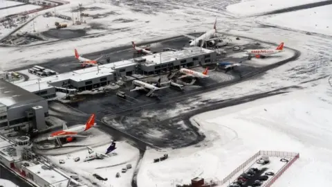 PA Newcastle airport in the snow