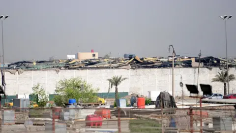 EPA Aftermath of explosion at Popular Mobilisation arms depot near Baghdad (13 August 2019)