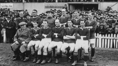 Topical Press Agency/Getty Images The Wales football team in Cardiff in 1921 before their match with England