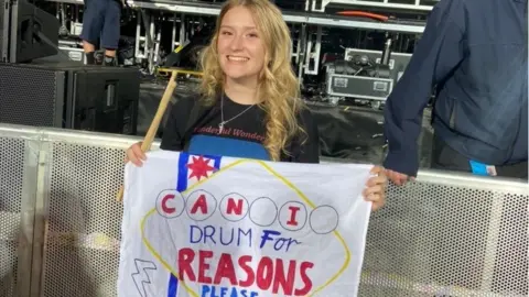 Grace/Submitted Grace with her sign, made to look like a Las Vegas sign