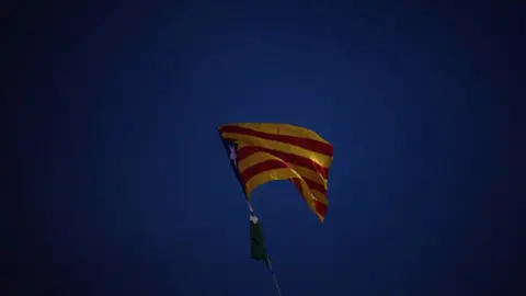 Getty Images A Catalan independence flag waves during a protest in Barcelona, 2 November