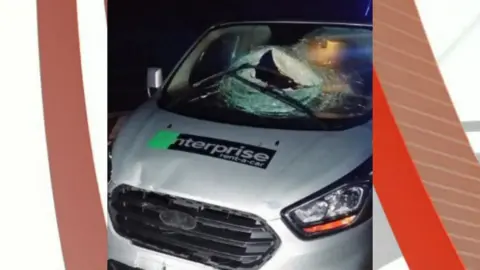 NWDevonPolice/Twitter Car damaged by breeze block. Pic: NWDevonPolice/Twitter