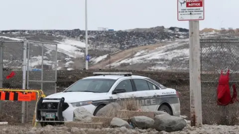 Reuters A police car blocks the entrance to the Brady Road Resource Management Facility, where the body of 33-year-old Linda Mary Beardy of Lake St. Martin First Nation was discovered, in Winnipeg, Manitoba, Canada, April 4, 2023.