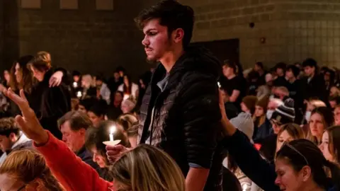 Reuters A student of Oxford High is prayed for during a prayer vigil at Lake Point Community Church in Oxford, Michigan
