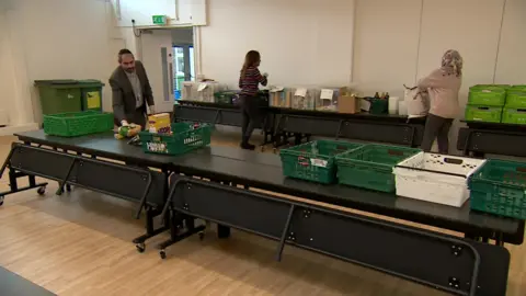 BBC Teachers packing food parcels