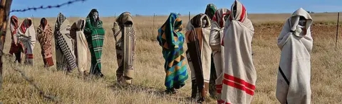 Getty Images Boys from the Xhosa tribe who have undergone a circumcision ceremony walk near Qunu on June 30, 2013.