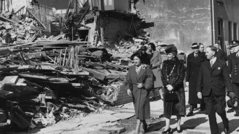 Getty Images Queen Elizabeth (later Queen Mother, 1900 - 2002, left) inspecting air-raid damage in Plymouth during the Blitz, 21st March 1941. With the Queen is local Member of Parliament Nancy Astor, Viscountess Astor (1879 - 1964).