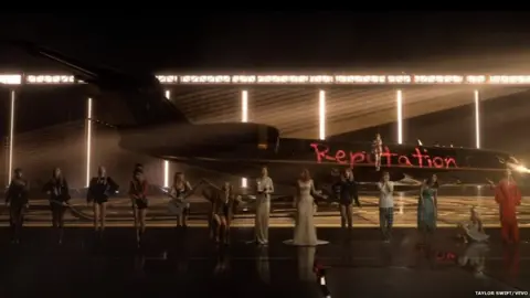 Taylor Swift/Vevo Taylor Swift scrawls Reputation on the side of a jet