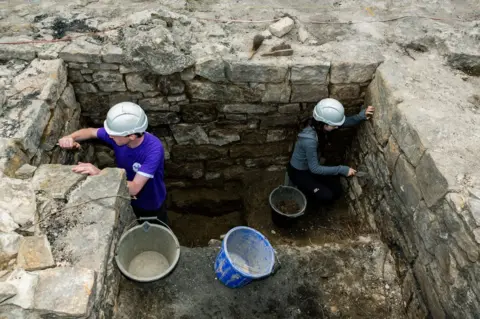 Jamie Sproates Durham University students at work at the excavation site at Auckland Castle