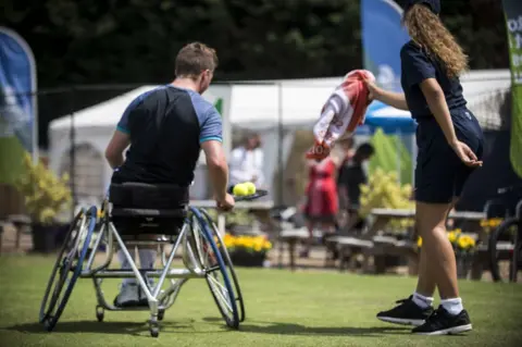 Phil Coomes/BBC Alfie Hewett and ball girl