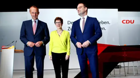 Reuters Christian Democratic Union (CDU) candidates for the party chair Friedrich Merz, Annegret Kramp-Karrenbauer and Jens Spahn