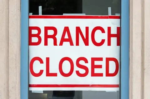 Getty Images Branch closed sign